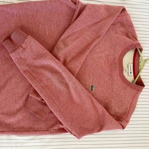 Lacoste pink sweatshirt.
